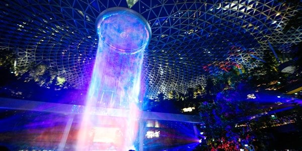 Laser light show over a packed dance floor